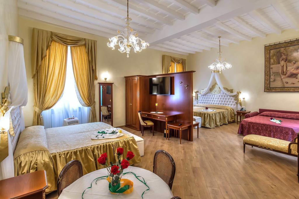 Trevi Rome Suite Quarto foto